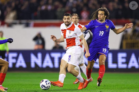 SPLIT, CROATIE - 20 MARS : Mateo Kovacic (Croatie) est défié par Matteo Guendouzi (France) lors du match aller des quarts de finale de l'UEFA Nations League entre la Croatie et la France au Stadion Poljud le 20 mars 2025 à Split, Croatie. Photo : Igor Kralj/PIXSELL