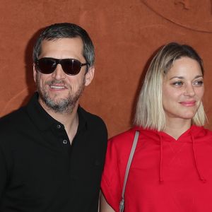 Guillaume Canet et Marion Cotillard au village lors des internationaux de tennis de Roland Garros à Paris, le 10 juin 2018. © Moreau-Jacovides/Bestimage