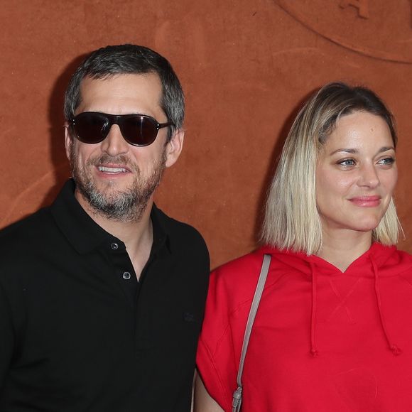 Guillaume Canet et Marion Cotillard au village lors des internationaux de tennis de Roland Garros à Paris, le 10 juin 2018. © Moreau-Jacovides/Bestimage