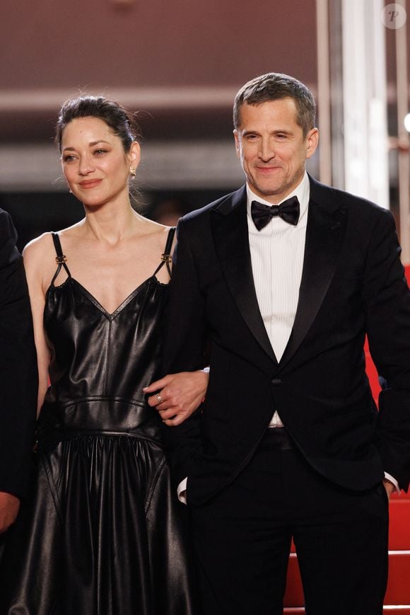 Marion Cotillard et Guillaume Canet - Descente des marches du film " Karma " lors du 79ème Festival International du Film de Cannes, le 15 mai 2026. © Jacovides-Moreau / Bestimage
