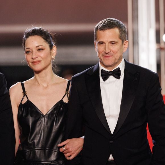 Marion Cotillard et Guillaume Canet - Descente des marches du film " Karma " lors du 79ème Festival International du Film de Cannes, le 15 mai 2026. © Jacovides-Moreau / Bestimage