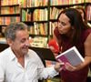 Salhia Brakhlia (journaliste au "Quotidien" sur TMC) avec Nicolas Sarkozy - L'ancien président de la République, dédicace son livre "Passions", à la librairie Jean Jaurès de Nice, France, le lundi 26 août 2019. . © Bruno Bebert/Bestimage