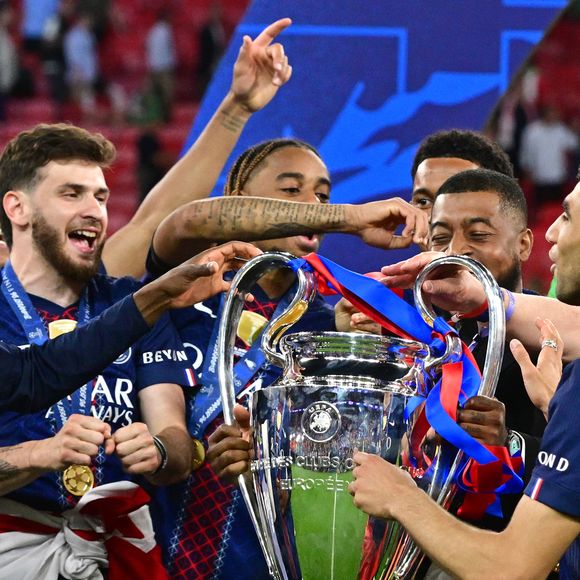 Ousmane Dembélé, Khvicha Kvaratskhelia, Bradley Barcola, Presnel Kimpembe, Marquinhos - Le PSG remporte la Ligue des Champions 2026, pour la seconde fois d'affilée face à Arsenal au stade Ferenc-Puskas à Budapest le 30 mai 2026. © Christian Liewig/Bestimage