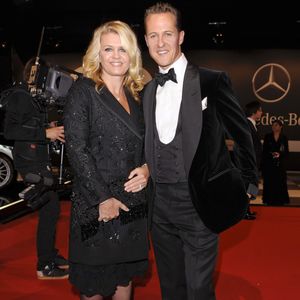Michael Schumacher et sa femme Corinna lors de la soiree GQ a Berlin en Allemagne le 29 octobre 2010. API / BESTIMAGE