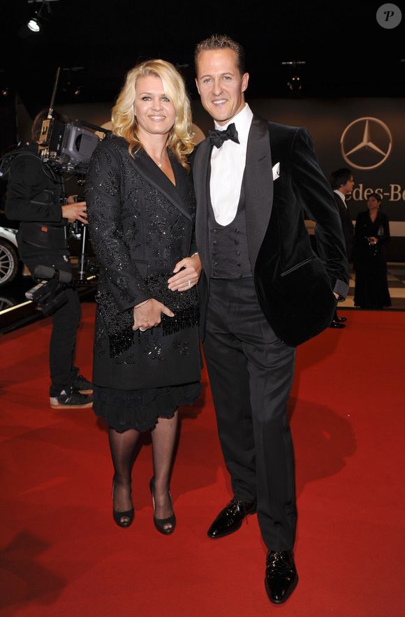 Michael Schumacher et sa femme Corinna lors de la soiree GQ a Berlin en Allemagne le 29 octobre 2010. API / BESTIMAGE