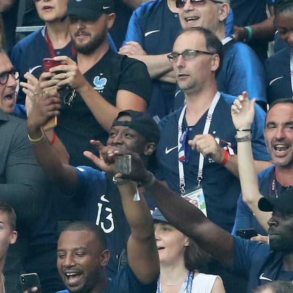 Teddy Riner, Nikos Aliagas et sa compagne Tina Grigoriou, Omar Sy au stade Loujniki lors de la finale de la Coupe du Monde de Football 2018 à Moscou, opposant la France à la Croatie à Moscou le 15 juillet 2018 © Cyril Moreau/Bestimage