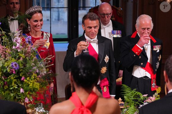 Le président Emmanuel Macron et sa femme Brigitte Macron lors d'un dîner d'état au chateau de Windsor avec le roi Charles III d'Angleterre et la reine consort Camilla le 8 juillet 2025.

© Yui Mok / Pool / Julien Burton via Bestimage