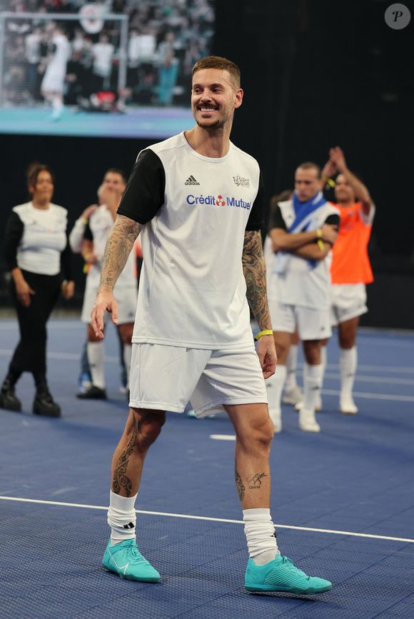 Matt Pokora (M. Pokora) - Match de futsal lors de la nouvelle édition du Foot-Concert organisé par le Réseau A.Ma.N.D./Huntington Avenir à la LDLC Arena à Lyon le 11 Novembre 2024. Cet événement solidaire unique en France rassemble le sport et la musique pour lutter contre les maladies neurodégénératives. © Dominique Jacovides/Bestimage