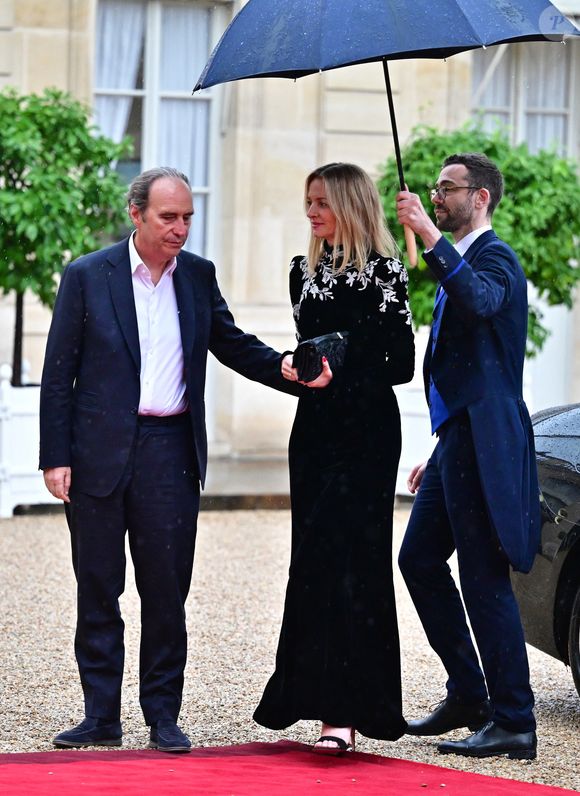 Xavier Niel, Pdg de Iliad et sa compagne Delphine Arnault , directrice de la maison Dior - Arrivées des personnalités au dîner d’État en l’honneur du président brésilien et de sa femme au palais présidentiel de l’Élysée à Paris le 5 juin 2025.

© Christian Liewig / Bestimage