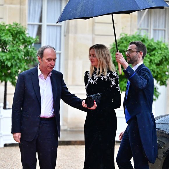 Xavier Niel, Pdg de Iliad et sa compagne Delphine Arnault , directrice de la maison Dior - Arrivées des personnalités au dîner d’État en l’honneur du président brésilien et de sa femme au palais présidentiel de l’Élysée à Paris le 5 juin 2025.

© Christian Liewig / Bestimage