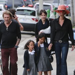 Exclusif - Johnny Hallyday et sa femme Laeticia accompagnent leurs filles Jade et Joy pour la rentrée des classes a Pacific Palisades, Los Angeles, ce 9 septembre 2013 © Bestimage