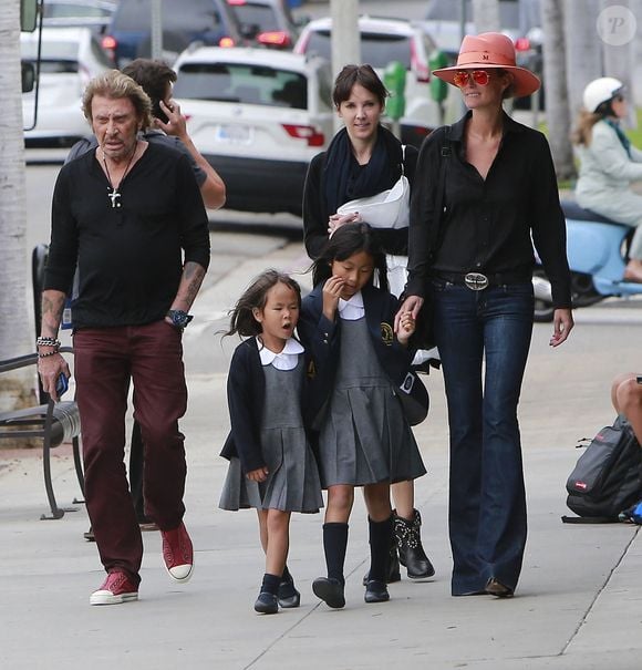 Exclusif - Johnny Hallyday et sa femme Laeticia accompagnent leurs filles Jade et Joy pour la rentrée des classes a Pacific Palisades, Los Angeles, ce 9 septembre 2013 © Bestimage