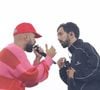 Bigflo et Oli (Florian et Olivier Ordonnez) lors du concert à l'occasion de l'opération "vacances de OUF, journée des oubliés des vacances" pour les 80 ans du Secours Populaire au Champ-de-Mars à Paris le 20 août 2025. © Coadic Guirec / Bestimage