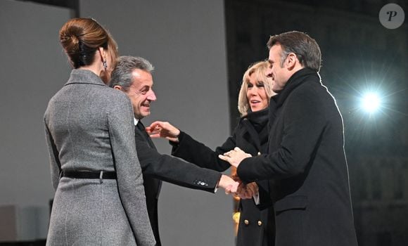 French President, Emmanuel Macron and his wife, Brigitte Macron, Former French President, Nicolas Sarkozy and his wife Carla Bruni attend the welcome ceremony at official reopening ceremony of Notre-Dame Cathedral in Paris, France on December 7, 2024, after more than five-years of reconstruction work following the April 2019 fire. © Eliot Blondet/Pool/Bestimage