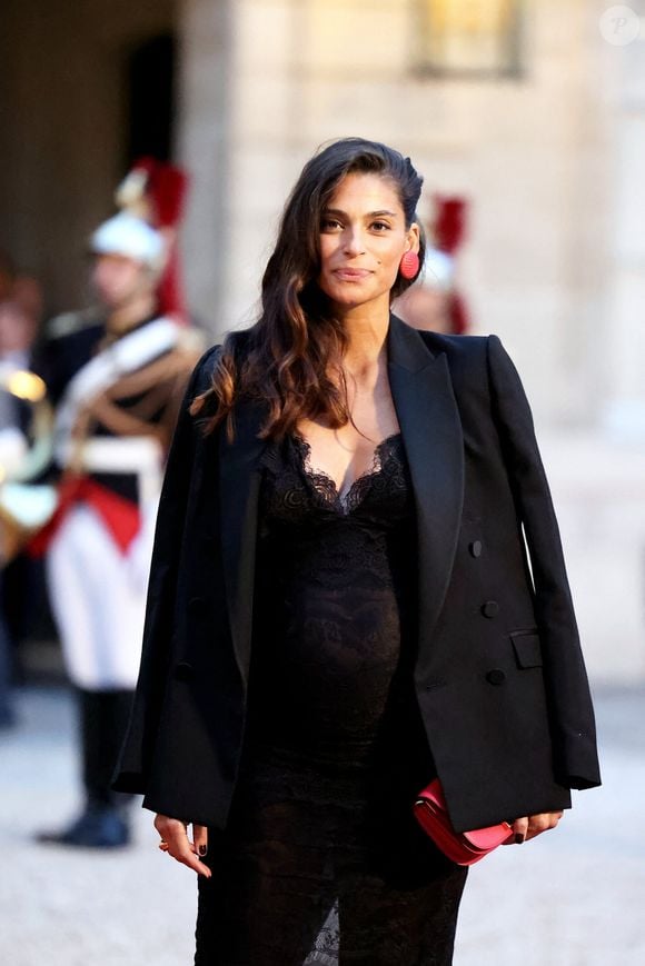 Tatiana Silva (enceinte, ancienne miss Belgique) arrivant au dîner d'état au palais de l'Elysée à Paris en l'honneur de la visite du roi et de la reine de Belgique en France le 14 octobre 2024.

© Dominique Jacovides / Bestimage