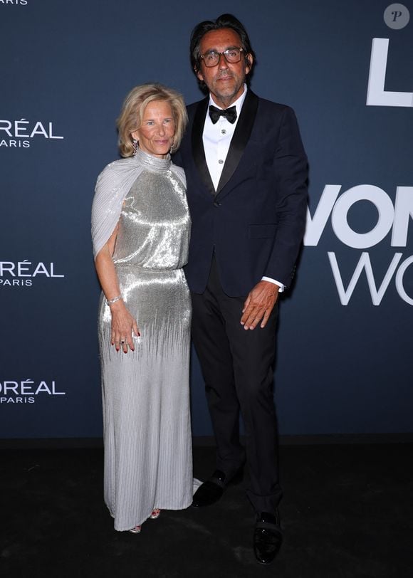 Iris Knobloch et son mari Francois Breavoine I - Photocall de la soirée "LOreal Lights on women's worth" lors du 79ème Festival international du Film de Cannes le 22 mai 2026.
© Denis Guignebourg / Bestimage