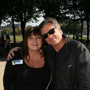 Ils se sont rencontrés à la télévision
Michèle Bernier et son ex-compagnon Bruno Gaccio - 2ème tournoi de pétanque au profit de l'association "MeghanOra" sur l'Esplanade des Invalides à Paris, le 28 septembre 2014. JLPPA / Bestimage