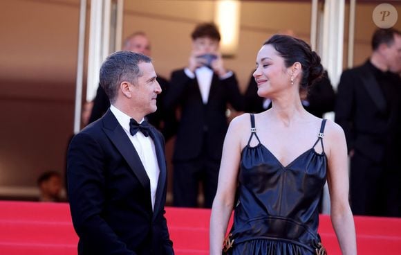 Guillaume Canet, Marion Cotillard - Montée des marches du film " Karma " lors du 79ème Festival International du Film de Cannes, le 15 mai 2026. © Jacovides-Moreau / Bestimage