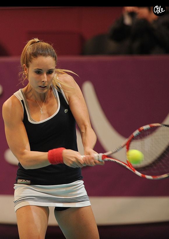 La francaise Alize Cornet (Fran) et Kristina Mladenovic (FRA) ont perdu face a Sara Errani (ITA) et Robert Vinci  (ITA) lors 1er tour double de l'Open GDF-SUEZ au Stade Pierre De Coubertin a Paris le 28 janvier 2013. Agence / Bestimage