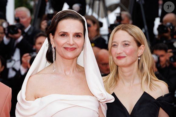 Le jury : Juliette Binoche, Alba Rohrwacher - Montée des marches du film « Partir un jour » pour la cérémonie d’ouverture du 78ème Festival International du Film de Cannes, au Palais des Festivals à Cannes. Le 13 mai 2025
© Jacovides-Moreau / Bestimage