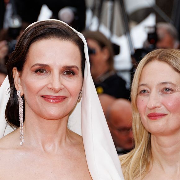 Le jury : Juliette Binoche, Alba Rohrwacher - Montée des marches du film « Partir un jour » pour la cérémonie d’ouverture du 78ème Festival International du Film de Cannes, au Palais des Festivals à Cannes. Le 13 mai 2025
© Jacovides-Moreau / Bestimage
