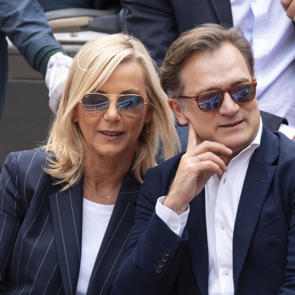 Renaud Capuçon et sa femme Laurence Ferrari en tribunes lors des Internationaux de France de Tennis de Roland Garros 2025, à Paris, France, le 7 juin 2025. © Cyril Moreau/Bestimage