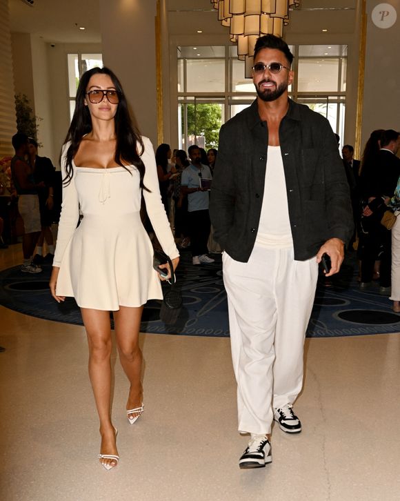 Nabilla Benattia et son mari Thomas Vergara quittent l'hôtel Martinez lors du 77ème Festival International du Film de Cannes (14 - 25 mai 2024), le 20 mai 2024.