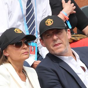 Jean-Luc Reichmann et sa femme Nathalie  dans les tribunes lors du Tournoi de Roland-Garros (les Internationaux de France de tennis) à Paris, le 27 mai 2016. © Cyril Moreau/Bestimage