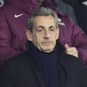 Nicolas Sarkozy dans les tribunes du match de Ligue 1 McDonald's opposant le Paris Saint-Germain (PSG) à Lyon (3-1) au Parc des Princes à Paris le 15 décembre 2024.