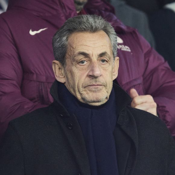 Nicolas Sarkozy dans les tribunes du match de Ligue 1 McDonald's opposant le Paris Saint-Germain (PSG) à Lyon (3-1) au Parc des Princes à Paris le 15 décembre 2024.
