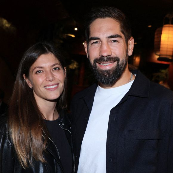 Exclusive - Nikola Karabatic et sa femme Geraldine Pillet assistent au lancement du livre de Philippe Spanghero " Au Nom du Clan " organisé par Five Eyes Production au Buddha Bar à Paris, France, le 11 septembre 2025. Photo by Jerome Domine/ABACAPRESS.COM