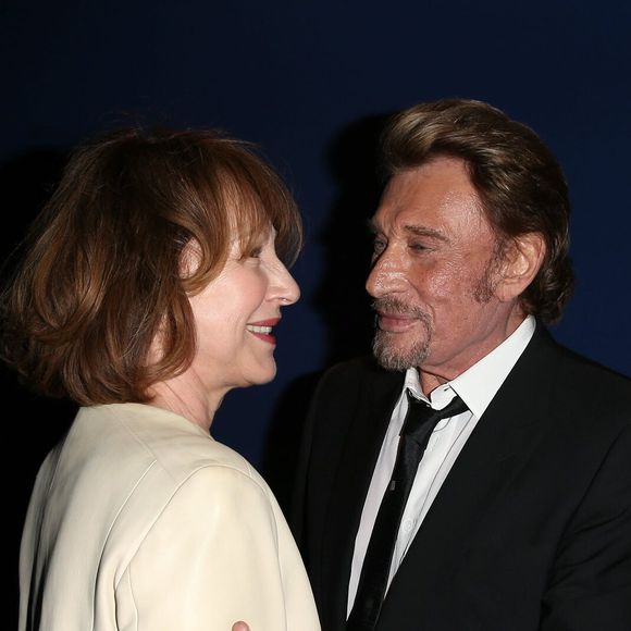 Nathalie Baye et Johnny Hallyday - Avant-première de 'Salaud on t'aime' à l'UGC Normandie sur les Champs-Elysées à Paris le 31 mars 2014. © Dominique Jacovides Bestimage
