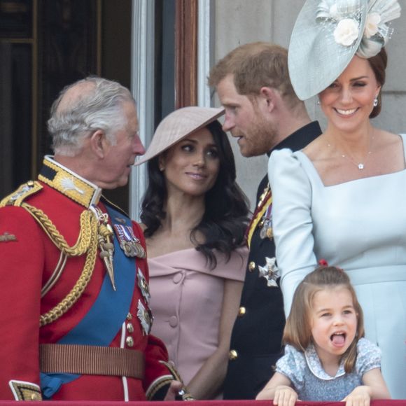 Le roi Charles III, Meghan Markle, le prince Harry, Kate Middleton et la princesse Charlotte  lors du rassemblement militaire "Trooping the Colour"  (le "salut aux couleurs"), célébrant l'anniversaire officiel du souverain britannique. Cette parade a lieu à Horse Guards Parade, chaque année au cours du deuxième samedi du mois de juin. Londres, le 9 juin 2018.