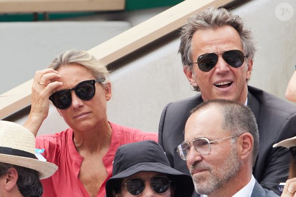 Anne-Sophie Lapix et son mari Arthur Sadoun - Célébrités en tribunes des Internationaux de France de tennis de Roland Garros 2023 à Paris le 11 juin 2023. © Jacovides-Moreau/Bestimage