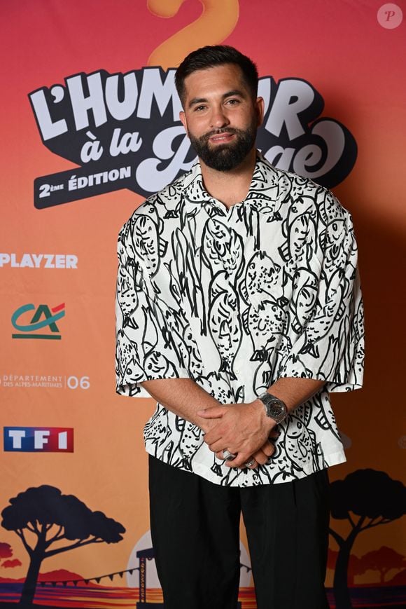 Aussi, il adore le poulet au barbecue, "avec sel, poivre".

Exclusif - Kendji Girac au photocall lors de l'enregistrement de l'émission "L'humour à la plage" pour la 2eme édition du festival de Juan les Pins à la pinède Gould le 27 juin 2025. © Bruno Bebert / Bestimage