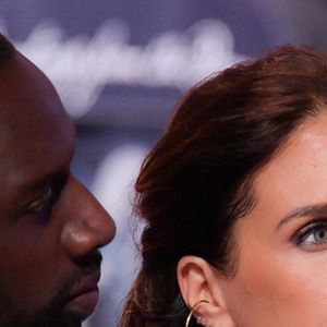 Omar Sy et son épouse Hélène Sy, au premier rang du défilé Louis Vuitton Homme Automne-Hiver 2024-2025, lors de la Fashion Week de Paris, le 16 janvier 2024. Photo : Jana Call me J/ABACAPRESS.COM