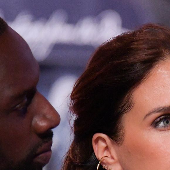 Omar Sy et son épouse Hélène Sy, au premier rang du défilé Louis Vuitton Homme Automne-Hiver 2024-2025, lors de la Fashion Week de Paris, le 16 janvier 2024. Photo : Jana Call me J/ABACAPRESS.COM