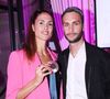 Elodie Clouvel et son compagnon Valentin Belaud - Photocall du 5ème gala de charité de l'association "Les Bonnes Fées" à l'occasion de la campagne mondiale "Octobre Rose" à l'hôtel Peninsula, Paris. © Rachid Bellak/Bestimage