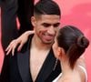 Une notoriété qui se reflète également dans les pages des magazines, où elle apparaît régulièrement. 

Achraf Hakimi et Hiba Abouk - Montée des marches du film « L’Innocent » lors du 75e Festival international du film de Cannes. Le 24 mai 2022
© Dominique Jacovides / Bestimage