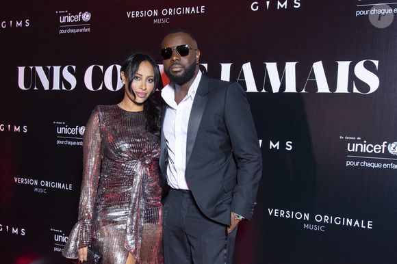 Gims et sa femme DemDem au photocall de la soirée "Unis comme jamais" au profit de l'Unicef, au pavillon Cambon à Paris. Le 8 novembre 2021. © Pierre Perusseau / Bestimage