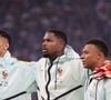 Sur le terrain, Kylian Mbappé n'arbore pas exactement la même tunique que le reste de l'Équipe de France.

William SALIBA (France), Mike MAIGNAN (France) et Kylian MBAPPÉ (France) - Les Bleus ont remporté leur dernier match de préparation contre l'Irlande du Nord (3-1) à Lille, grâce à un triplé de M. Olise le 8 juin 2026. © Laurent Sanson/PsnewZ/Bestimage