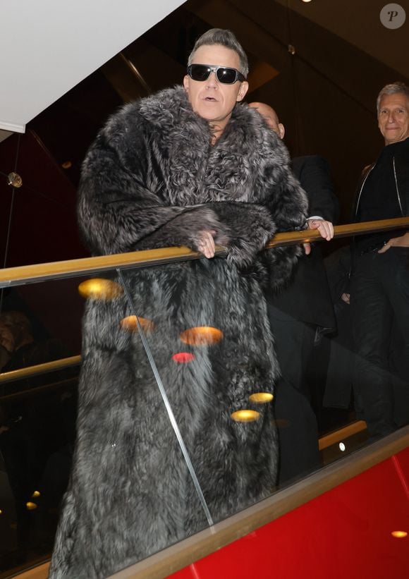 De nombreuses célébrités françaises ont fait le déplacement pour assister à cet évènement ce jour-là

Robbie Williams - Avant-première du film "Better Man" au Grand Rex à Paris. Le 13 décembre 2024
© Coadic Guirec / Bestimage