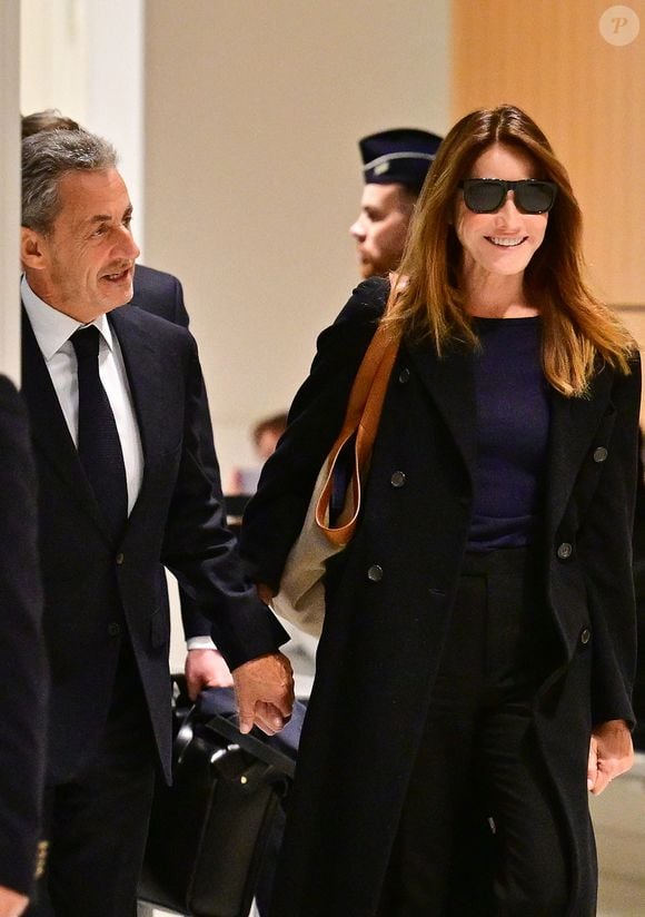 Nicolas Sarkozy et sa femme Carla Bruni au Tribunal judiciaire (Batignolles, 32ème chambre correctionnelle) pour l'annonce de la décision dans le cadre du procès Lybien le 25 septembre 2025.

© Christian Liewig / Bestimage