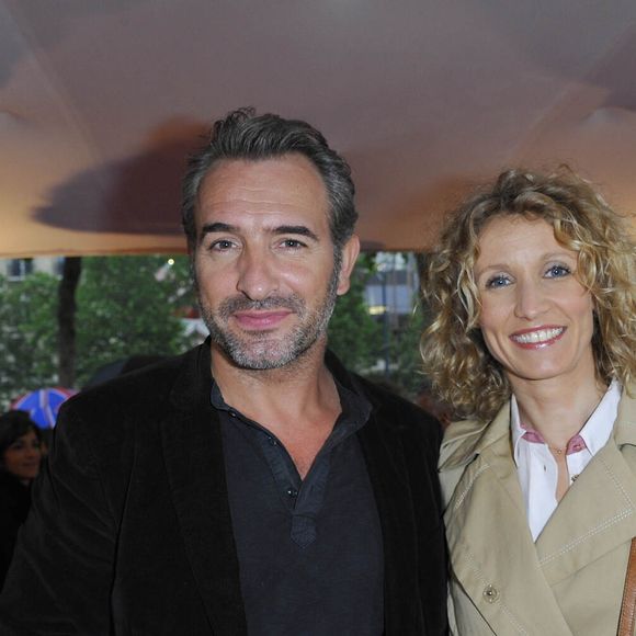 Jean Dujardin et Alexandra Lamy - Avant-première du film "Un bonheur n'arrive jamais seul" au Gaumont Marignan à paris le 15 juin 2012 ©Agence/ Bestimage