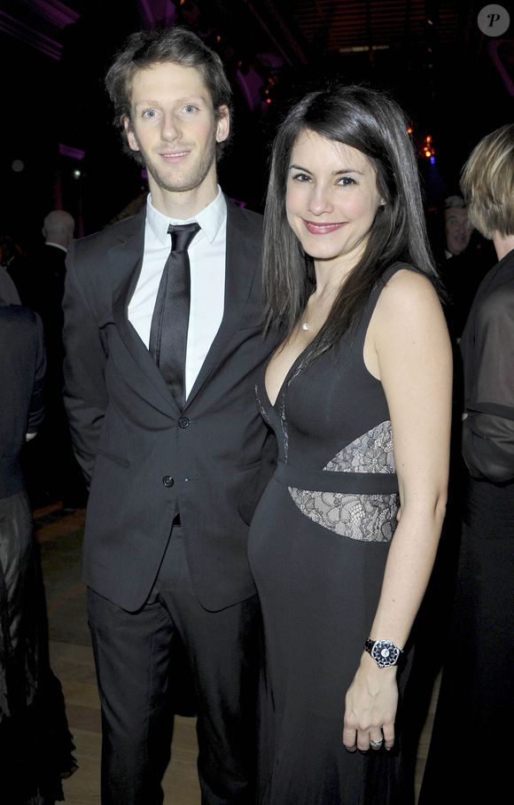 Romain Grosjean et sa femme Marion Jolles enceinte - Diner de Gala du 92eme Grand Prix d' Amerique au Grand Palais a Paris le 26 Janvier 2013.