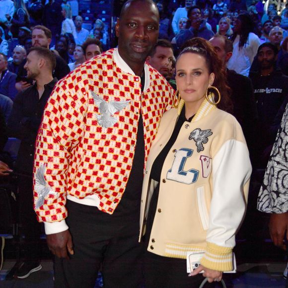 Omar Sy et sa femme Hélène - Célébrités assistent au match 1 du NBA Paris Games 2025 à L'Accor Arena Bercy à Paris le 23 janvier 2025. © Veeren/Bestimage