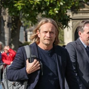 Jérémie Rénier et Natacha Régnier aux arrivées des obsèques d'Emilie Dequenne au cimetière Père Lachaise à Paris, France, le 26 mars 2025. © Cyril Moreau/Bestimage