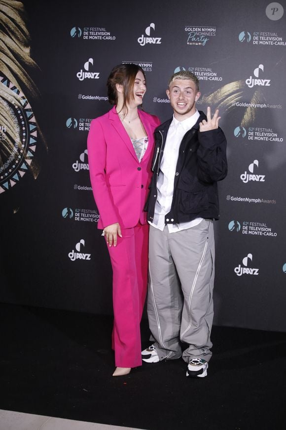 Elsa Bois et Michou au photocall de la soirée des nominées 'Golden Nymph nominées party' lors du 62ème Festival de Télévision de Monte-Carlo, à Monaco, le 20 Juin 2023. 
© Denis Guignebourg/BestImage