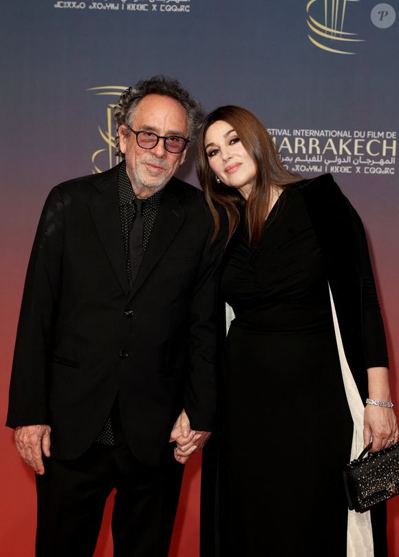 Tim Burton et Monica Bellucci au photocall de la cérémonie d'ouverture et à la projection du film "L'Ordre" lors du 21ème Festival international du film de Marrakech, le 29 novembre 2024j à Marrakech, Maroc. © Dominique Jacovides/Bestimage