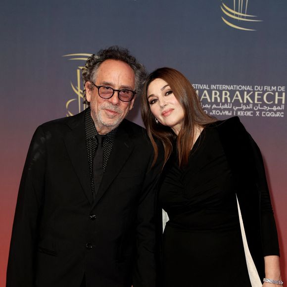 Tim Burton et Monica Bellucci au photocall de la cérémonie d'ouverture et à la projection du film "L'Ordre" lors du 21ème Festival international du film de Marrakech, le 29 novembre 2024j à Marrakech, Maroc. © Dominique Jacovides/Bestimage